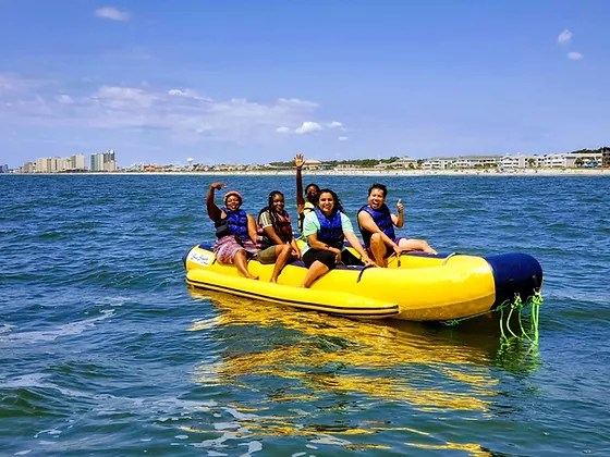 A pontoon boat is like a floating patio. Big Island Banana Boat Aloha Watersports