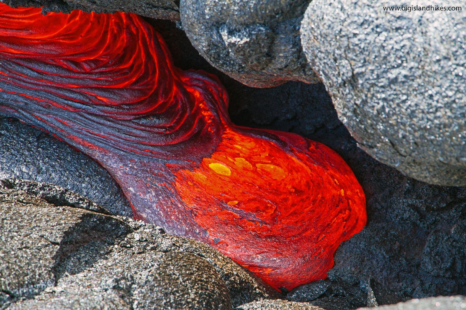 Lava flows are a breathtaking natural feature to behold — as long as it's from a safe distance, which is possible at these spots around the globe. Hike To Flowing Lava Big Island Hikes
